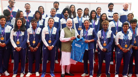 Harmanpreet Kaur, who captained the side to the Asiad gold, presented a jersey signed by the medal-winning team to PM Narendra Modi. (Photo: @narendramodi via X)