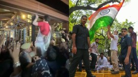 Priyanka Gandhi climbs and opens the gates of Kingway Camp, where his brother was detained and Rahul Gandhi climbs barricades during a protest in New Delhi. (Source: Screengrab/ Express photo by Abhinav Saha)