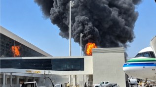 Smoke and flames rise from King Khalid Airport, after Yemen's Iran-backed Houthis said they attacked the airport, in Riyadh, Saudi Arabia, October 8, 2026. (Reuters)