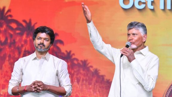 Tamil Nadu Chief Minister Joseph Vijay with Andhra Pradesh CM N Chandrababu Naidu during the Vijayawada Utsav 2.0 celebrations, at Punnami Ghat, in Vijayawada. (PTI Photo)