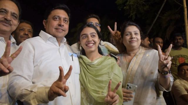 Congress candidate Abhijeet Wanjari with family members after defeating BJP nominee Sudhakar Kohale by 3,271 votes after more than 40 hours of counting. (Express